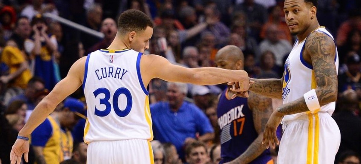 Curry flirts with triple-double, Warriors top Suns 112-104