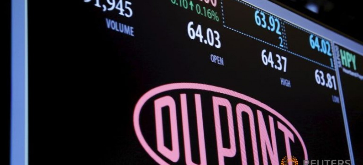 DuPont reports 4Q loss, steps up cost cuts ahead of Dow deal