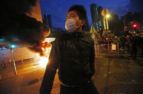 Hong Kong activists, police clash over holiday food stalls