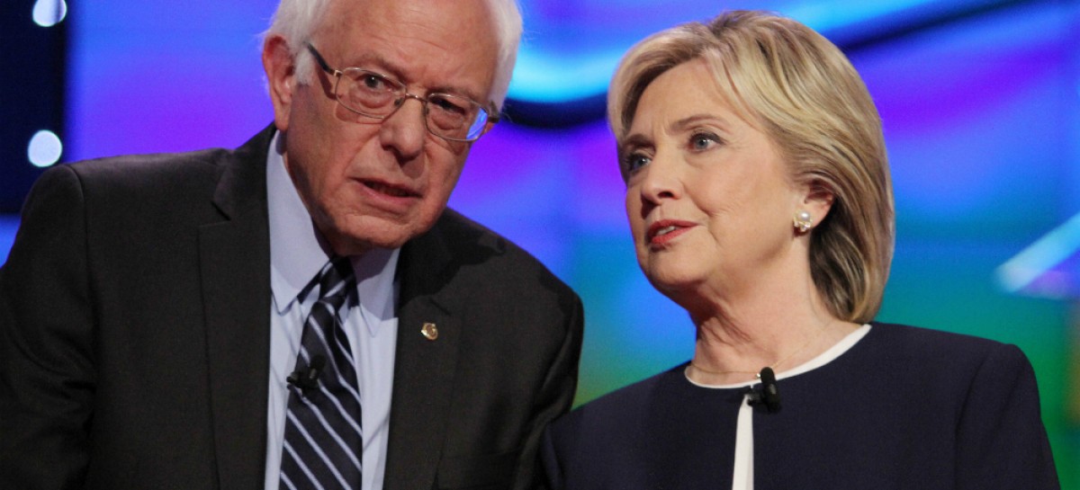 With Giffords in Iowa, Clinton criticizes Sanders on guns