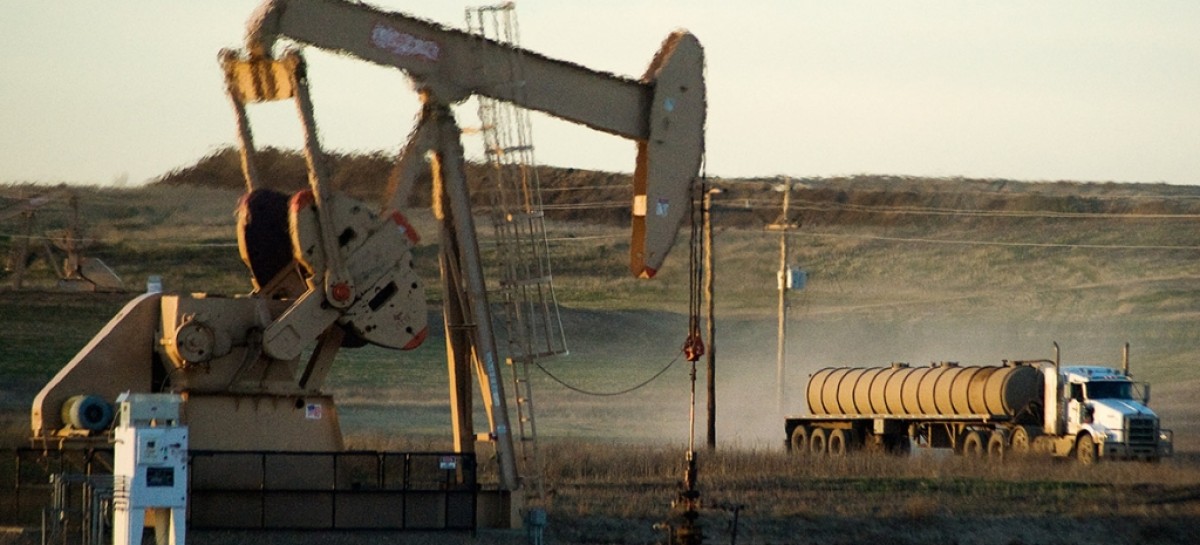 Oil prices spike on output meeting