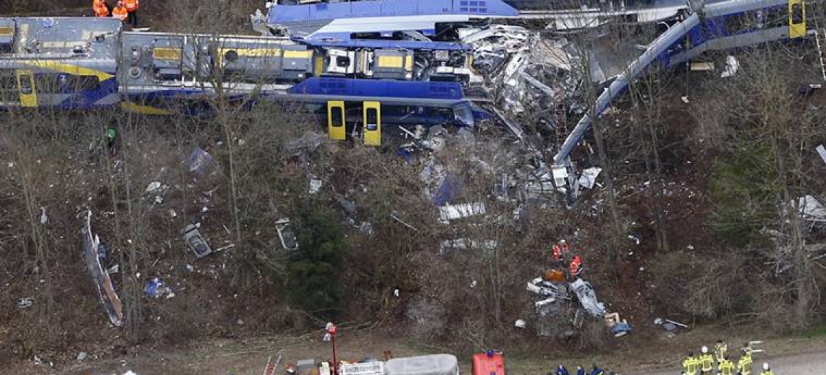 Train wreckage being removed in Germany; answers sought