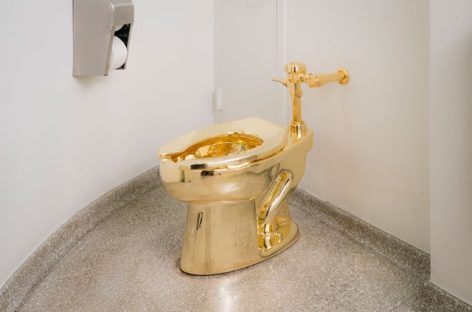 Gold toilet opens for business at Guggenheim