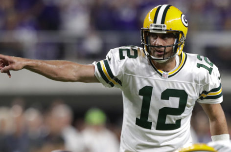 Offense hums early before Packers hold off Lions 34-27