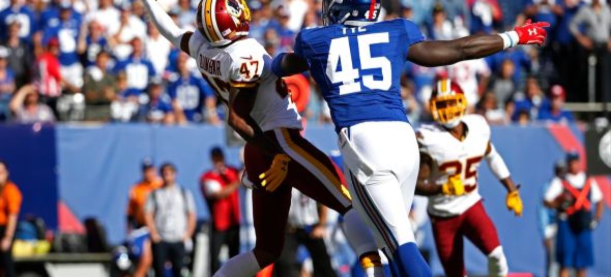 Under-fire Cousins helps Redskins beat Giants for first win