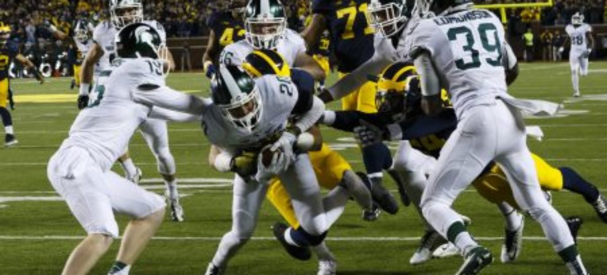 No. 2 Michigan stays unbeaten with 32-23 win at Michigan St