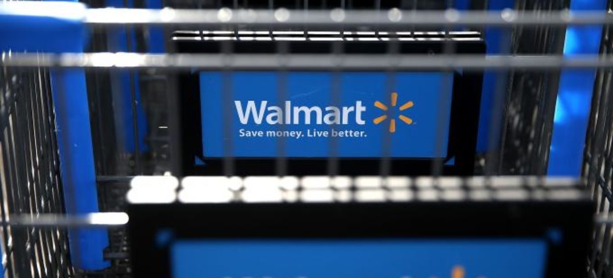 Wal-Mart plans to slow new store openings, invest in online