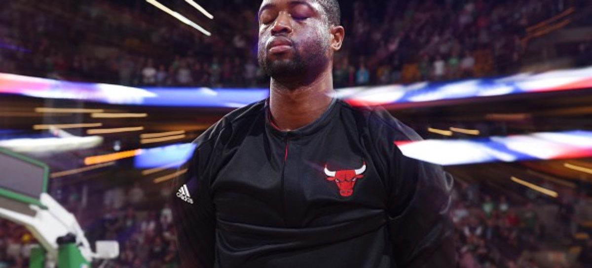 Wade gets standing ovations, wins in Miami return