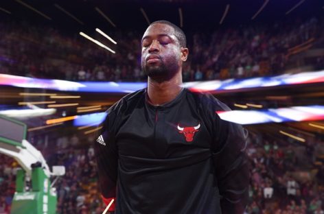 Wade gets standing ovations, wins in Miami return