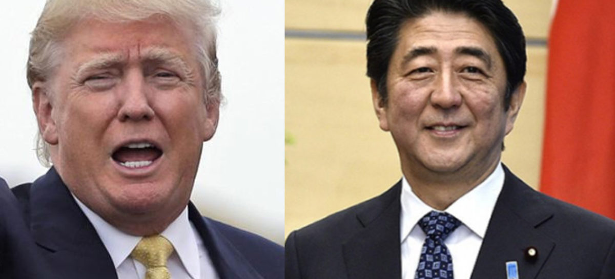 Abe and Trump high-five on golf course