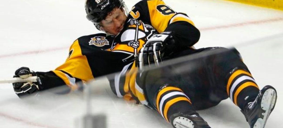 Capitals win in OT; Penguins lose Crosby to injury