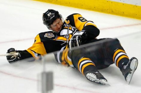 Capitals win in OT; Penguins lose Crosby to injury