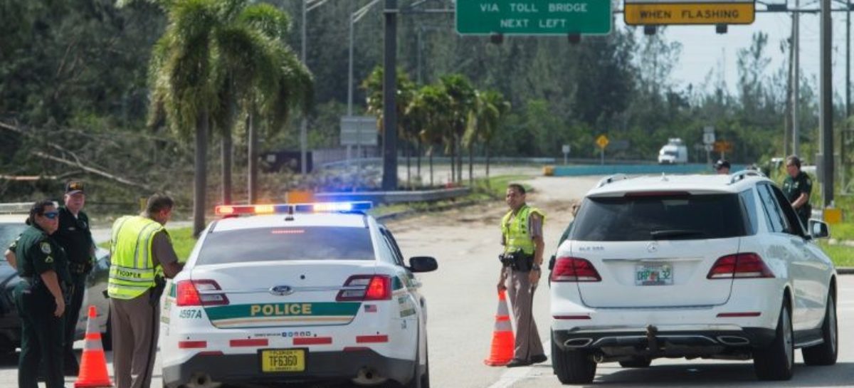 Floridians return to storm-battered homes