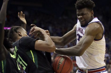 Kansas State guard Barry Brown Jr. exits with apparent eye injury